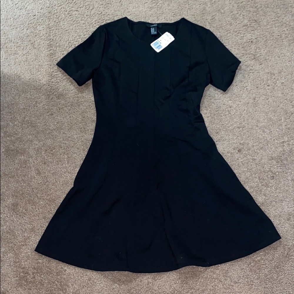 Black “pleated” mini dress